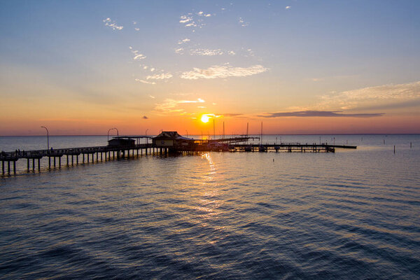 Fairhope, Alabama Pier at sunset on Mobile Bay 