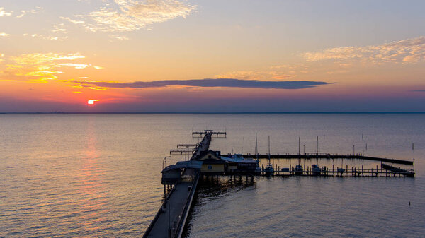 Fairhope, Alabama Pier at sunset on Mobile Bay 