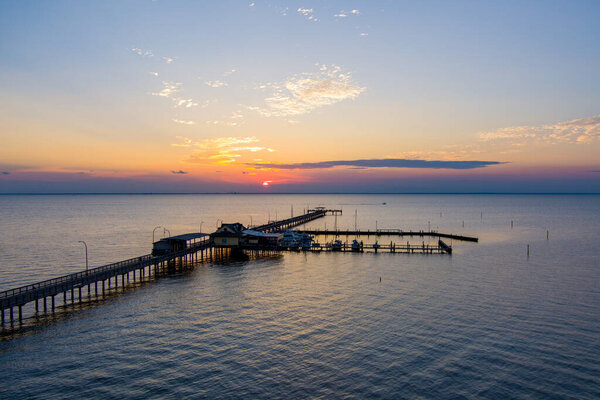 Fairhope, Alabama Pier at sunset on Mobile Bay 