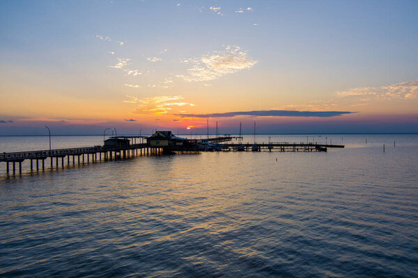 Fairhope, Alabama Pier at sunset on Mobile Bay 