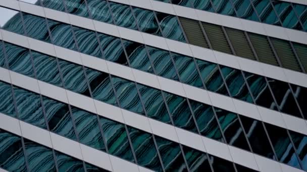 Moskow, Russia, August 30, 2020, Closeup view of glass tall building on Moscow city street in summer day outdoors. — Stock Video