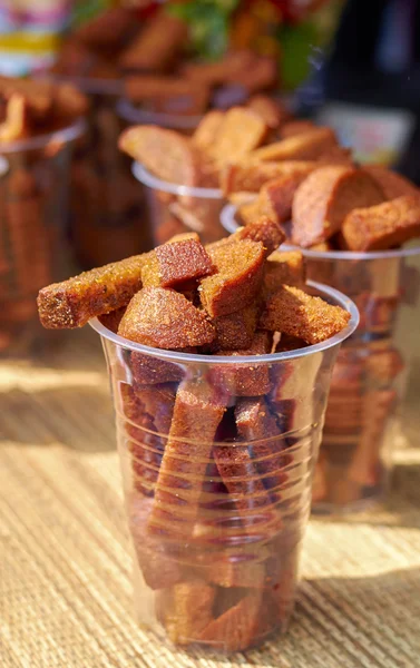 Delicious fried croutons in a cup closeup — Stock Photo, Image