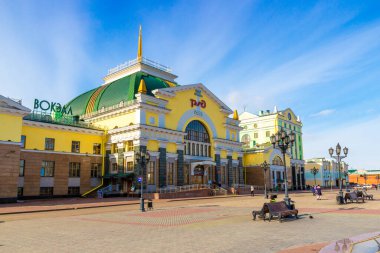 Krasnoyarsk, Russia - March 27, 2021: City square. Krasnoyarsk-Passazhirsky is the main railway station in the city of Krasnoyarsk. Located at 4098 km of the Trans-Siberian Railway. clipart