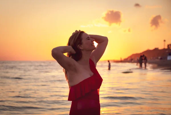 Carefree Woman Red Swimsuit Dancing Sunset Beach Mature Woman Relaxation — Stock Photo, Image