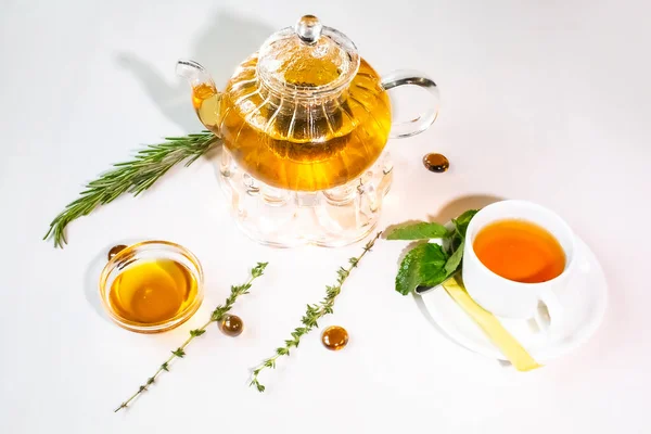 Fragrant Fresh Herbal Tea Melissa Glass Teapot Warming Candle White — Stock Photo, Image