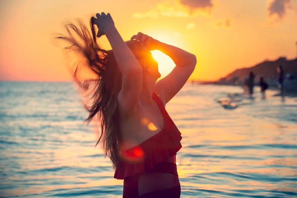 Carefree Woman Red Swimsuit Dancing Sunset Beach Mature Woman Relaxation — Stock Photo, Image