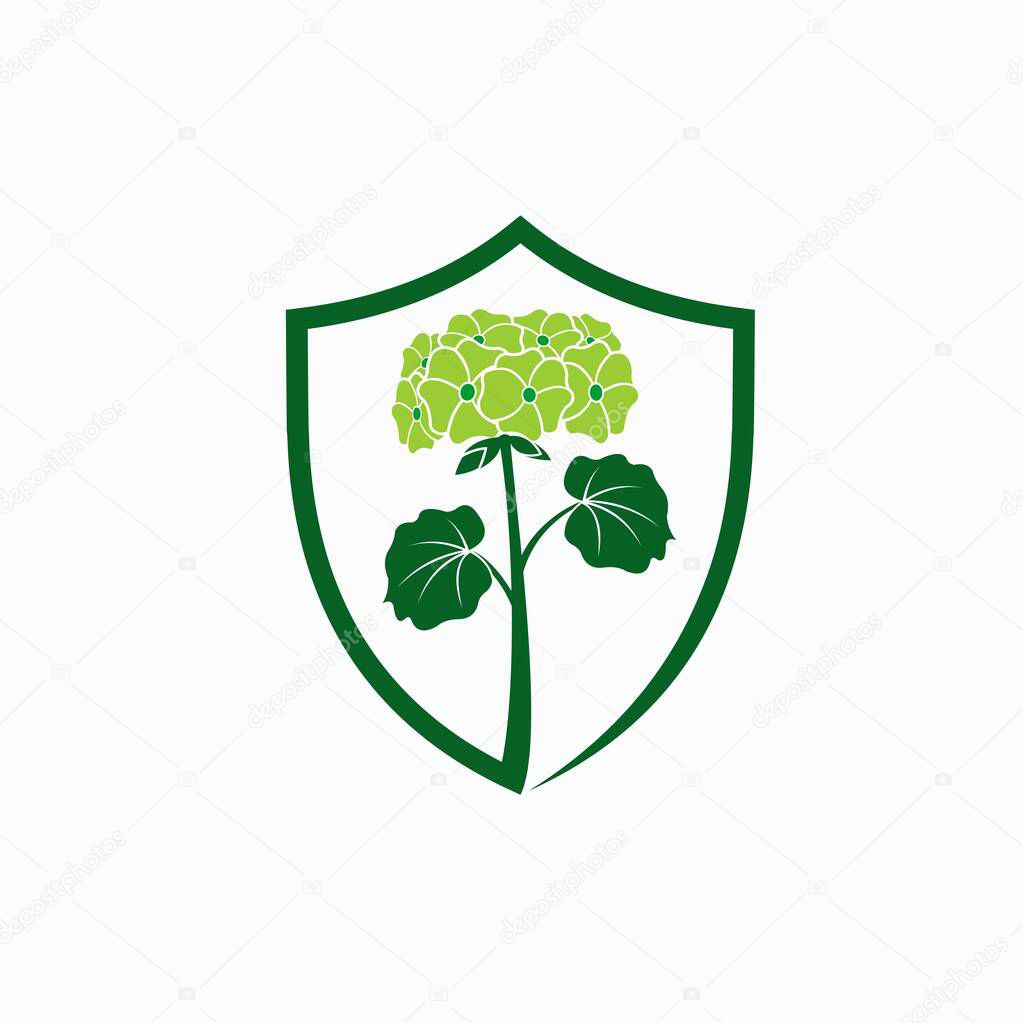 Green flower vector with shield concept