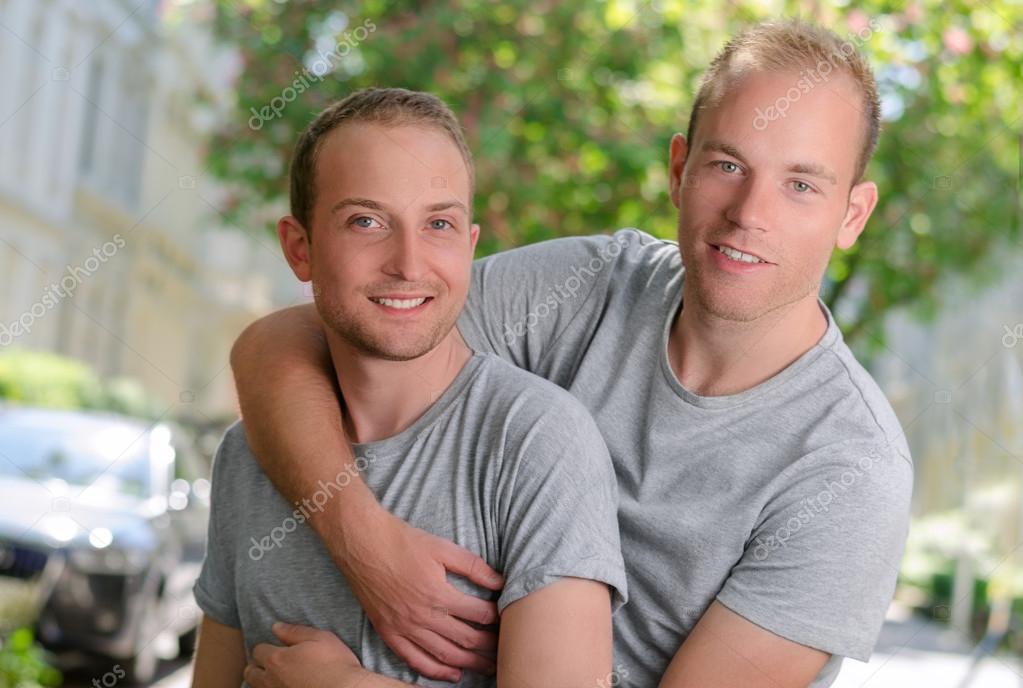 Guys hugging two Post from