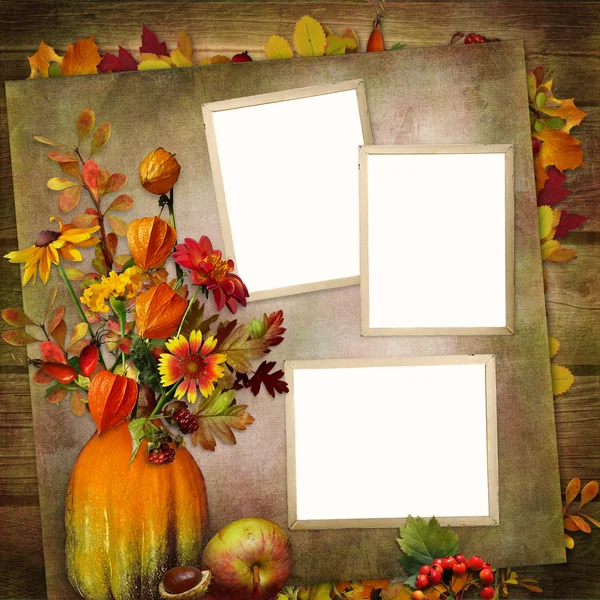 Background with frames, a bouquet of autumn leaves and berries in a vase from pumpkin — Stock Photo, Image