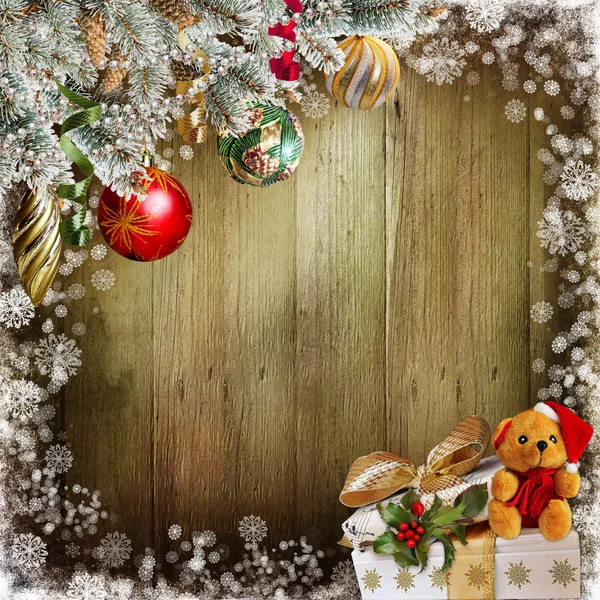 Weihnachten Hintergrund mit Tannenzweigen, Kugeln, Geschenken und Spielzeug — Stockfoto