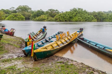 Boats on Beni river clipart
