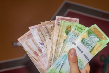 Stack of Venezuelan currency . clipart