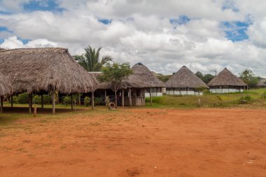 Simple houses in an indigenous village clipart