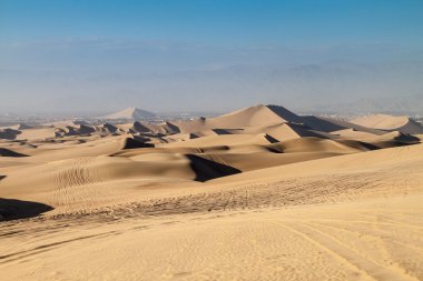 Sand dunes in Huacachina desert, Ica Region, Peru clipart