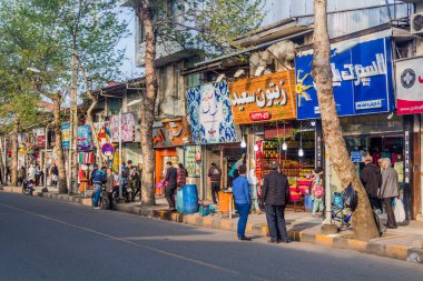 LAHIJAN, IRAN - APRIL 8, 2018: Shops lining a street in Lahijan, Gilan province, Iran clipart