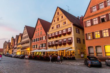 DINKELSBUHL, GERMANY - AUGUST 29, 2019: Evening view of medieval houses in Dinkelsbuhl, Bavaria state, Germany
