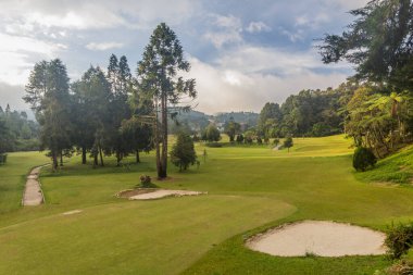Sultan Ahmad Shah Golf Club in the Cameron Highlands, Malaysia clipart