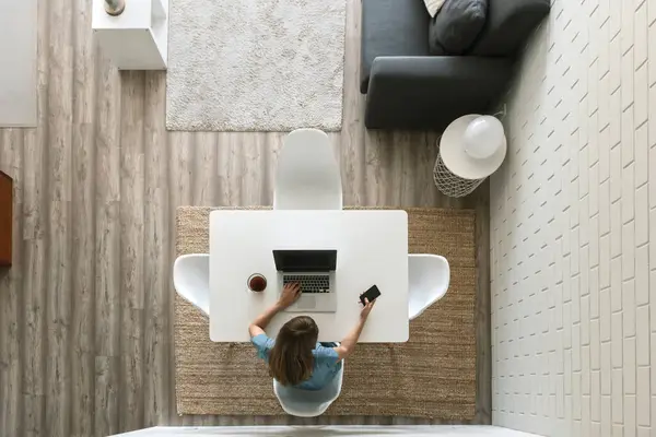 Woman Sitting Table Modern Loft Using Laptop Smartphone Top View — Stock Photo, Image