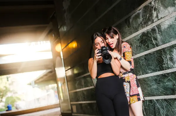Two Young Woman Checking Photos Camera — Stock Photo, Image