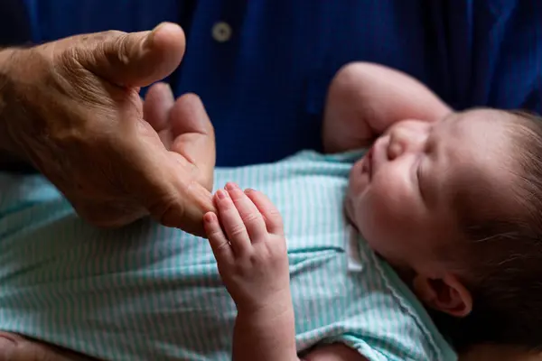 Sleeping Newborn Baby Holding Grandfathers Finger — Stock Photo, Image