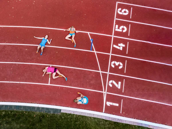 Germany Baden Wurttemberg Winterbach Aerial View Three Female Sprinters Resting — Stock Photo, Image