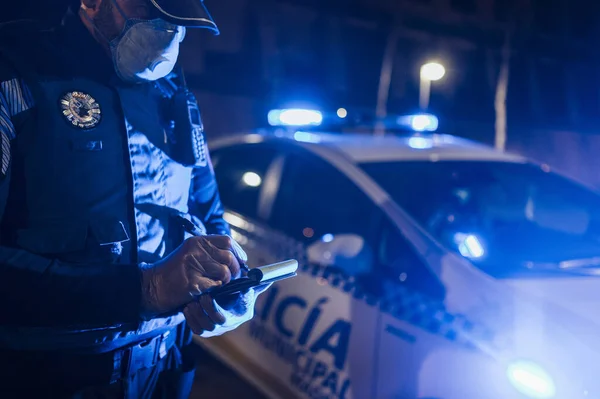 Policeman Emergency Mission Night Taking Notes Wearing Protective Gloves Mask — Stock Photo, Image