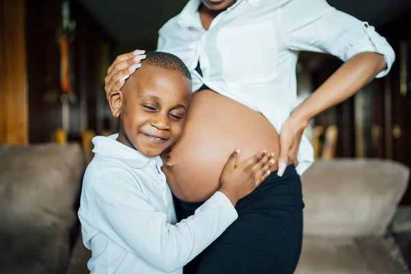 Little Boy Listening Belly Pregnant Young Woman — Stock Photo, Image