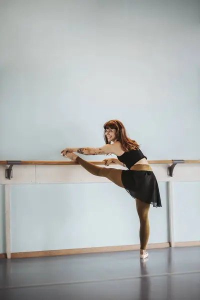 Happy Ballet Dancer Stretching Leg Dance Studio — Stock Photo, Image