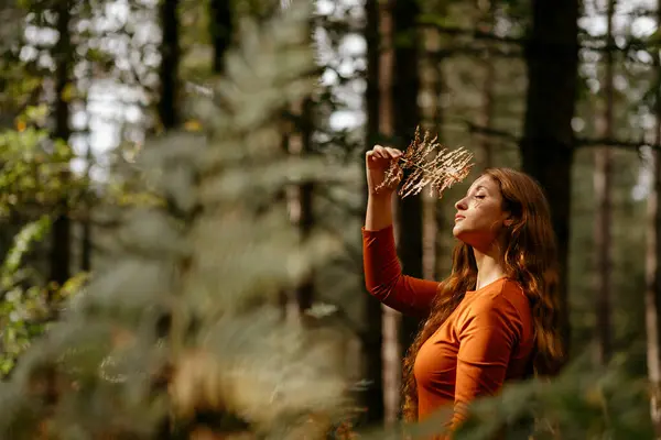 Young Woman Eyes Closed Holding Plant While Standing Trees Forest — Stock Photo, Image