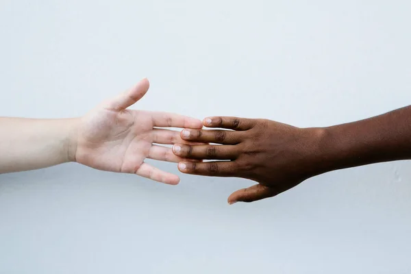 Friends Holding Hand White Wall — Stock Photo, Image