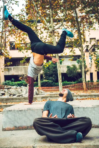 Young Man Looking Friend Performing Handstand Public Park — Stock Photo, Image