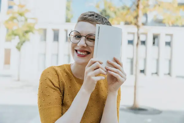 Woman Hiding Face Book While Sitting Sunny Day — Stock Photo, Image