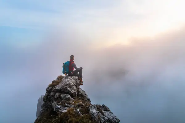 Pensive Male Hiker Sitting Mountain Peak Sunrise Bergamasque Alps Italy — Stock fotografie