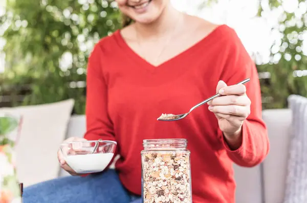 Smiling Woman Holding Milk Bowl Preparing Oats While Sitting Backyard — Stock Photo, Image