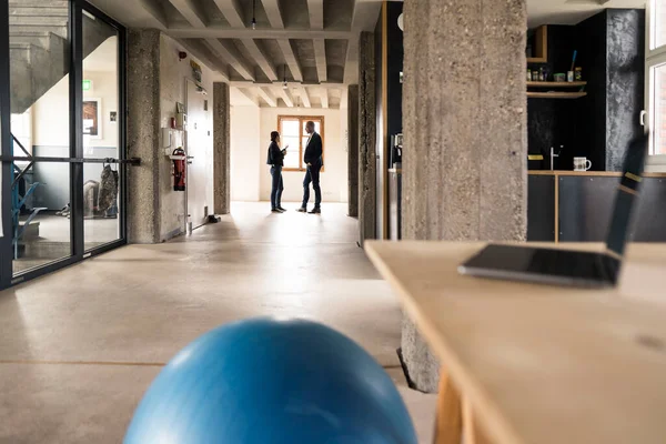 Business People Having Conversation While Standing Window Office — Stock Photo, Image