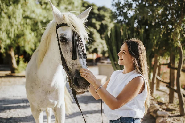 Beautiful Young Woman Gently Stroking White Horse — Stock Photo, Image