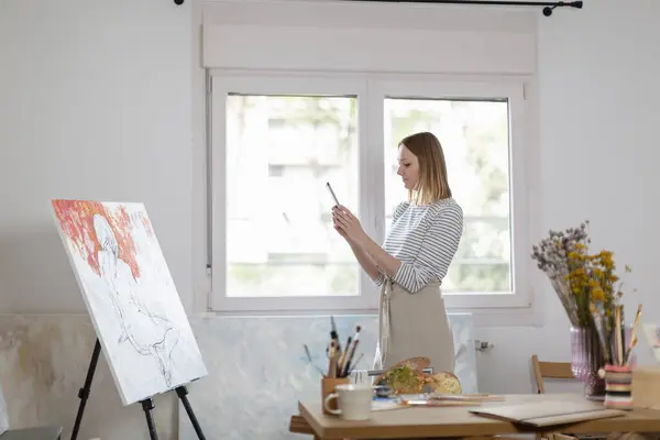 Female Artist Taking Photo Painting Smart Phone While Standing Home — Stock Photo, Image