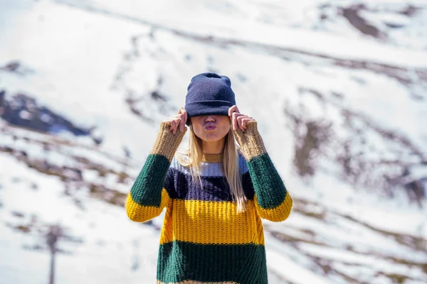 Woman Covering Eyes Knit Hat Snowcapped Mountain — Stock Photo, Image