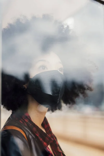Thoughtful Woman Protective Face Mask Looking Glass Wall — Stock Photo, Image