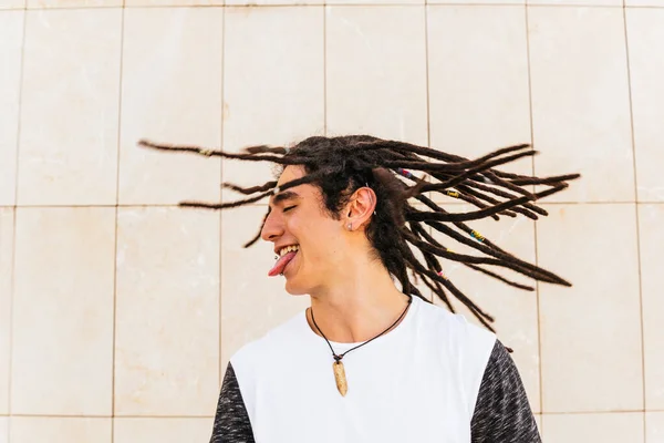 Man Dreadlocks Shaking Head While Sticking Out Tongue Front Wall — Stock Photo, Image
