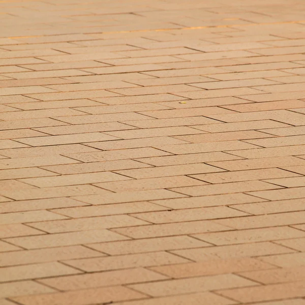 Trottoaren bakgrund av kullersten stenar — Stockfoto