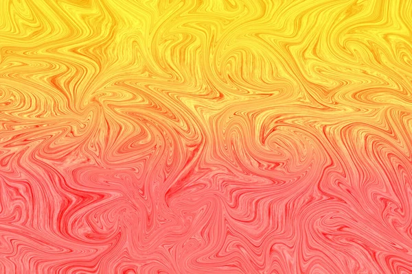 Liquid yellow and red paint on white paper abstract background