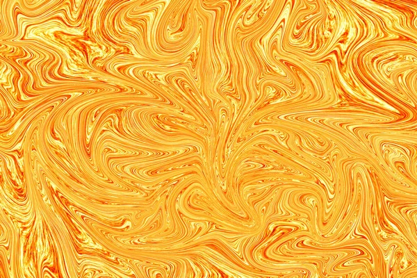 Liquid gold paint on white paper abstract background