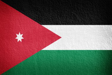 la bandera Jordana pintado en la pared de grunge 