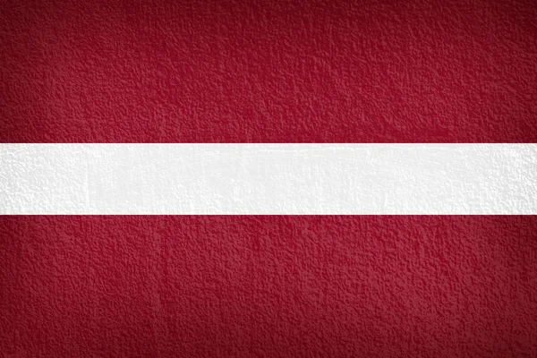 Letónia Bandeira na textura da parede — Fotografia de Stock