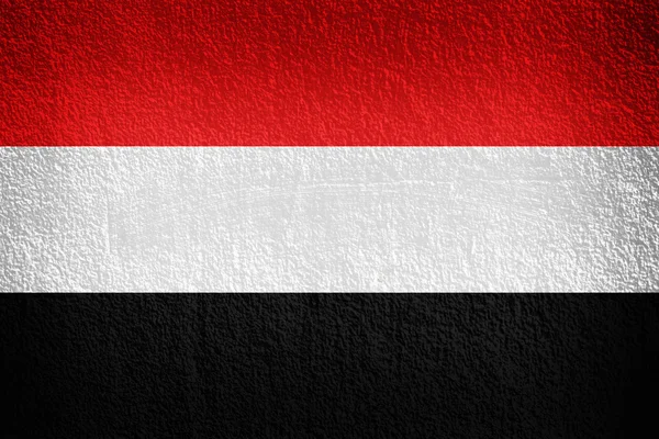 Yemen Bandeira na textura da parede — Fotografia de Stock