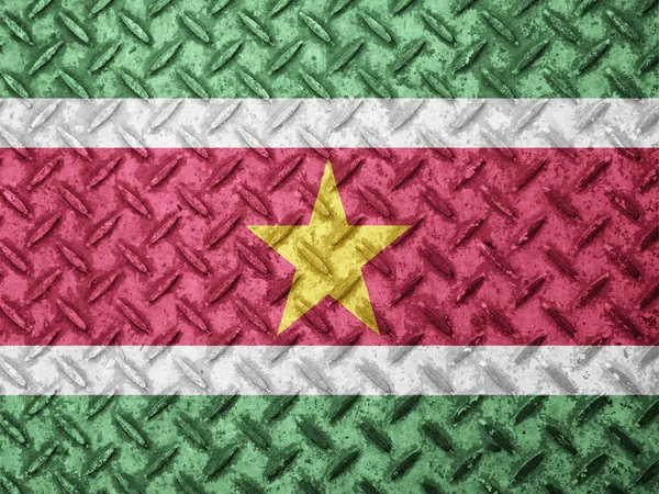 Suriname vlag op grunge muur — Stockfoto