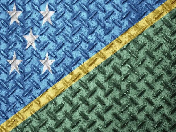 Solomon Islands bandeira na parede grunge — Fotografia de Stock