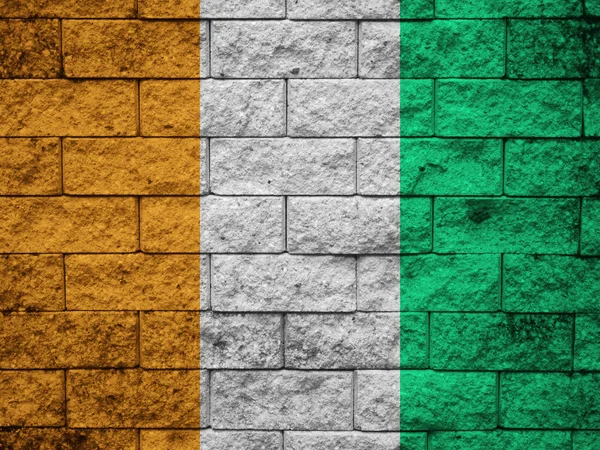 Прапор Кот-д'Івуар, намальовані на стіні гранж — стокове фото