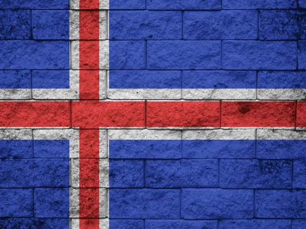 Исландский флаг, нарисованный на гранж-стене — стоковое фото